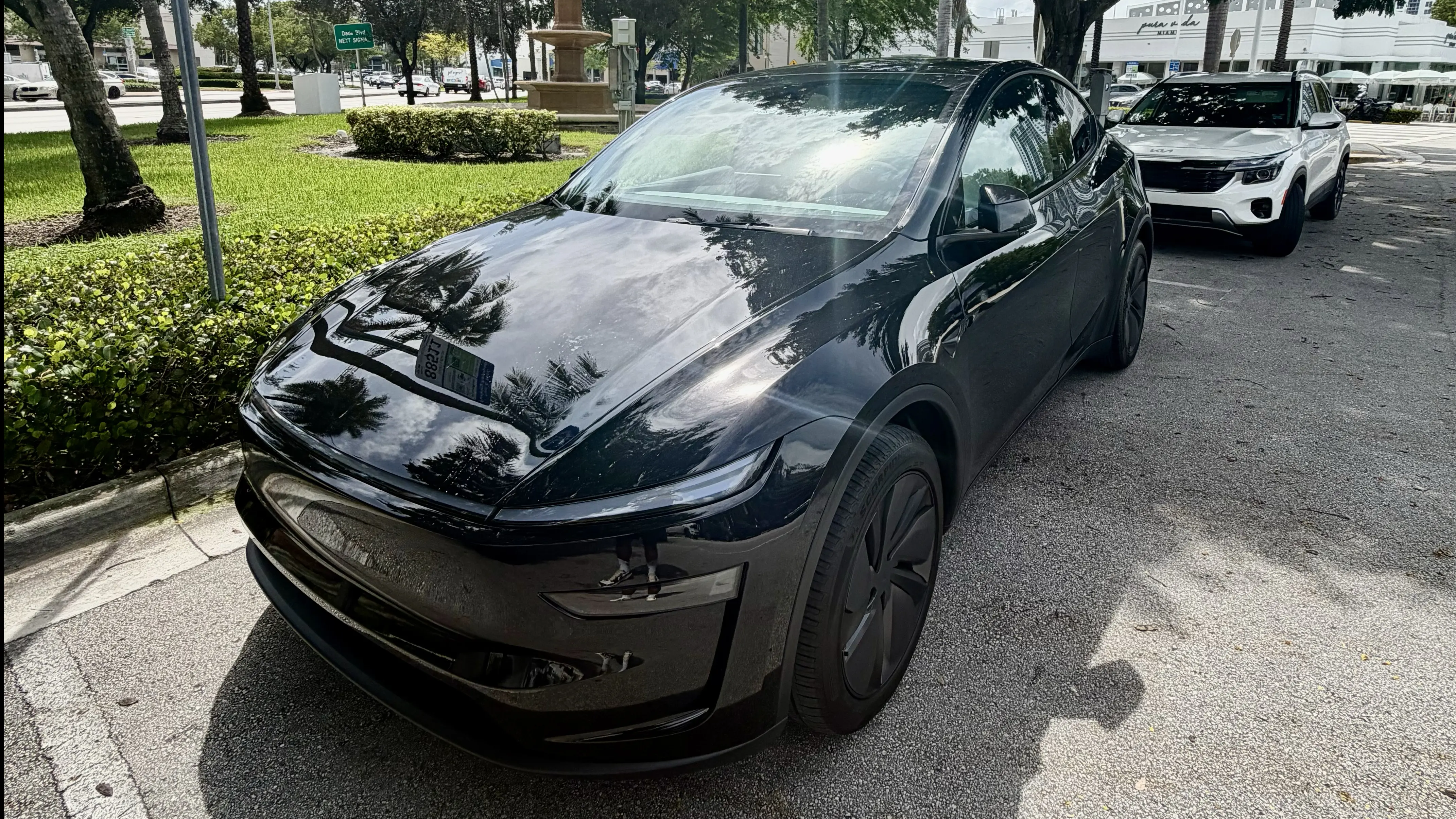 2026 Tesla Model Y in black — photo 1